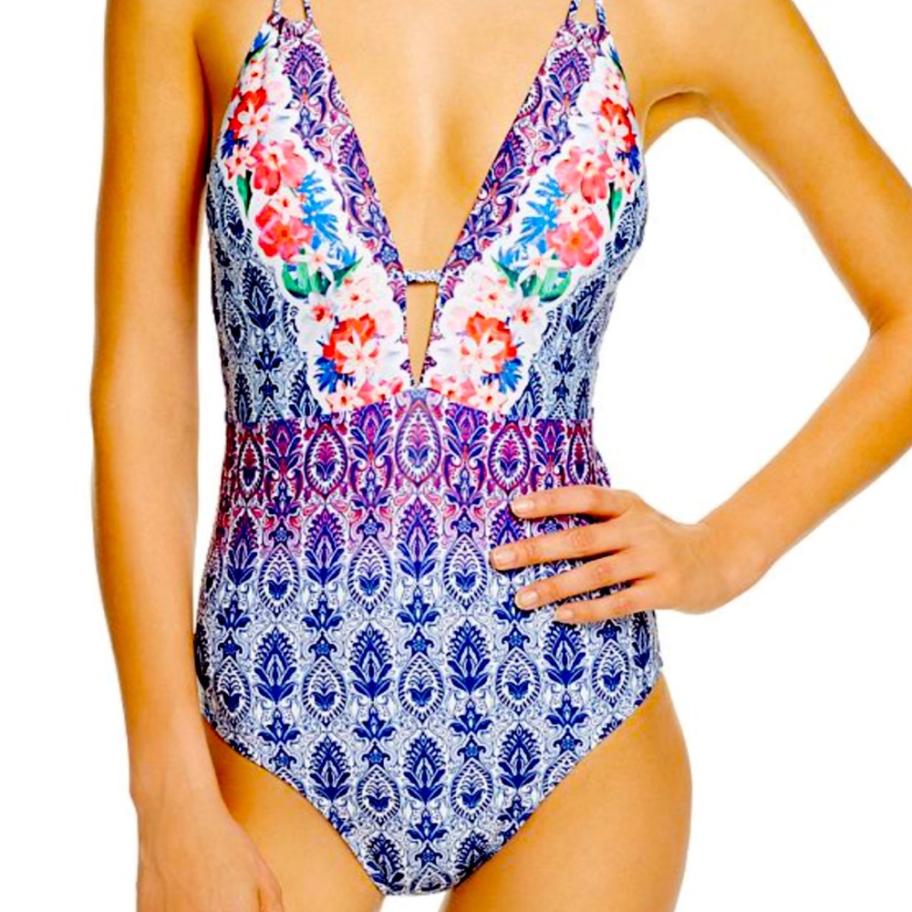 Nanette Lepore size L one piece swimsuit. Low cut in front and back.